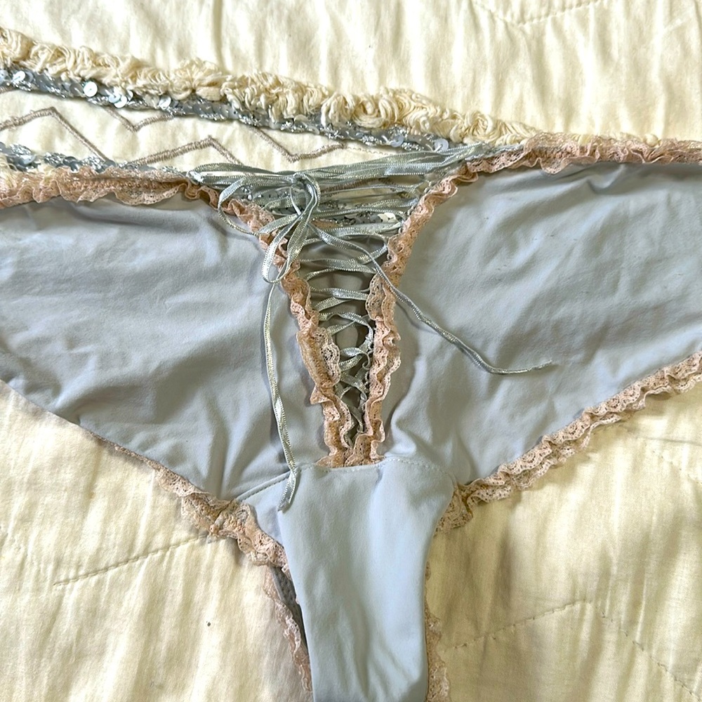 VS Sexy Little things tie up bikini panty. Pale blue w/ cream lace trim. Size L.